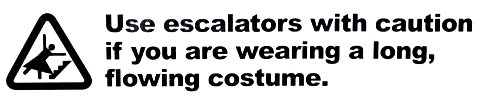 Use escalators with caution if you are wearing a long, flowing costume Sign at Sakura-Con